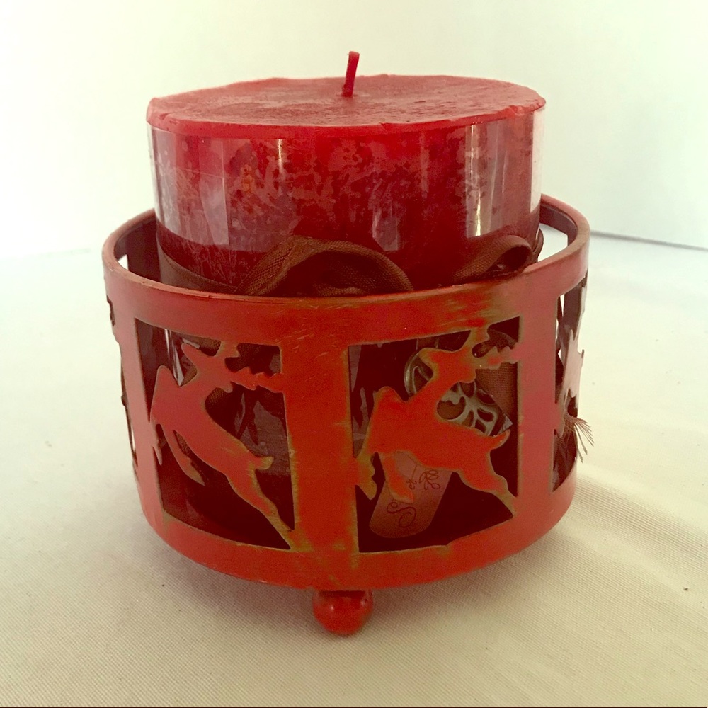 Christmas red candle with reindeer holder